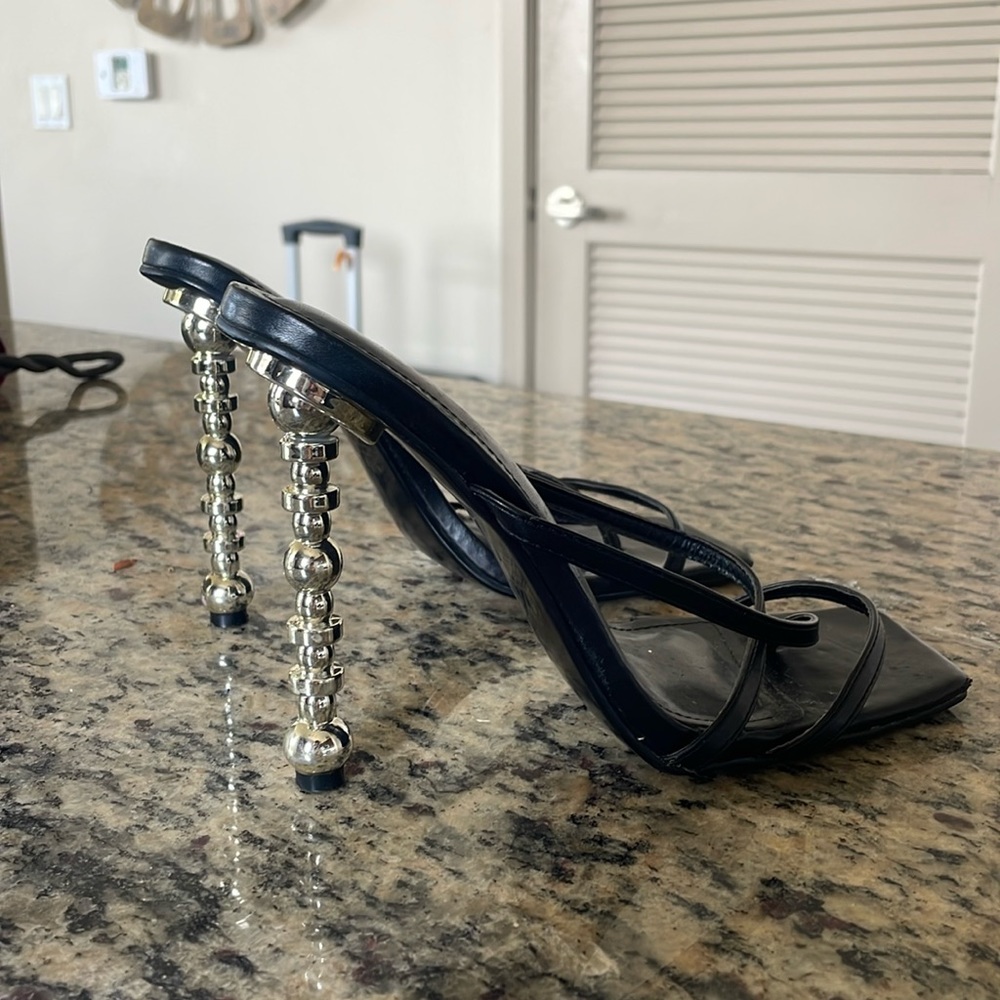 Cape Robbin black heals with silver metal heal size 8